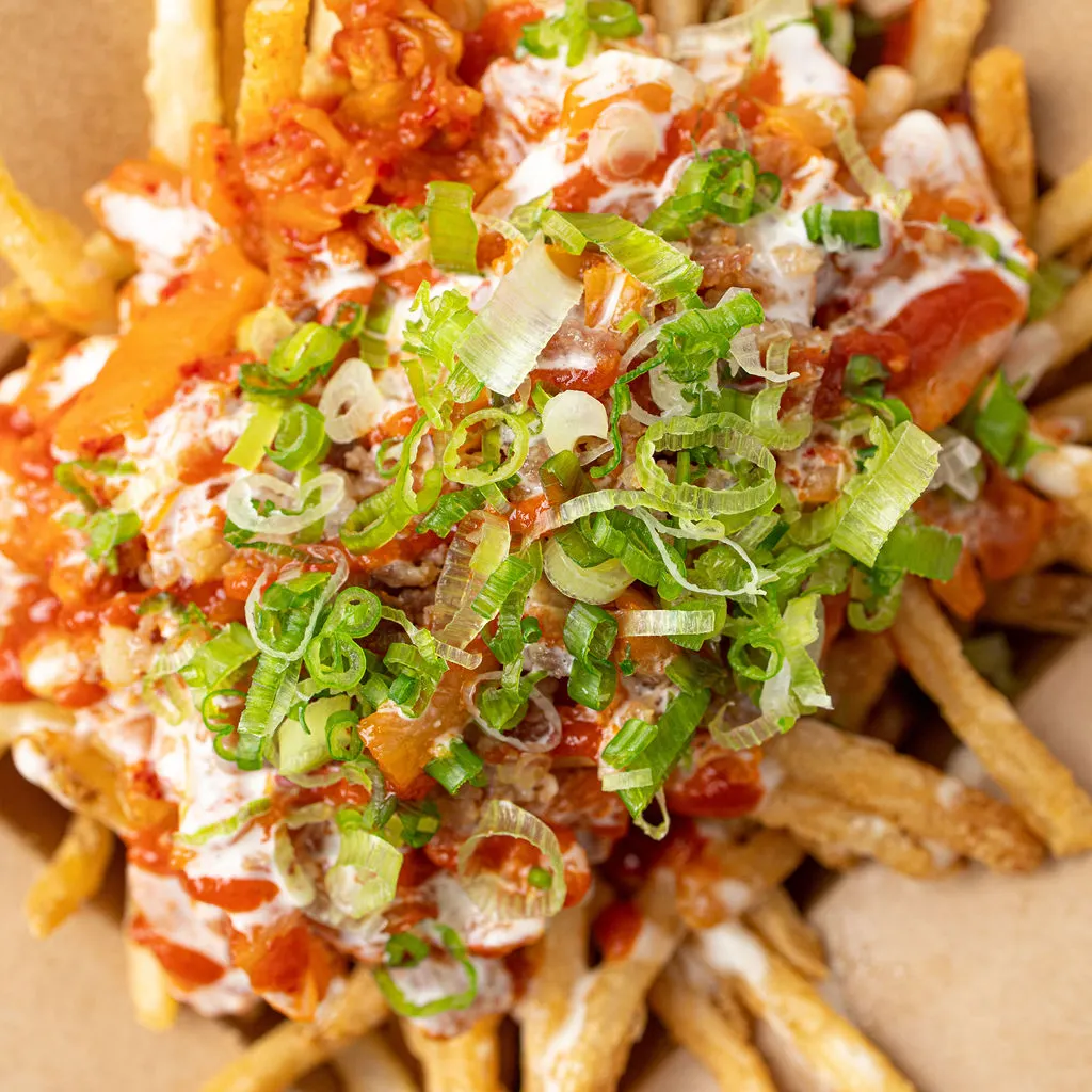 Bacon kimchi loaded fries topped with scallions